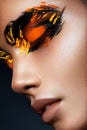 Beauty fashion model girl with dark bright orange