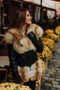 Beauty Fashion Model Girl in Fox Fur Coat Royalty Free Stock Photo