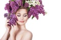 Beauty fashion model Girl with Lilac Flowers Hairstyle. Royalty Free Stock Photo