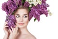 Beauty fashion model Girl with Lilac Flowers Hairstyle. Royalty Free Stock Photo