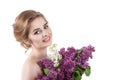 Beauty fashion model Girl with Lilac Flowers Hairstyle. Royalty Free Stock Photo