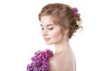 Beauty fashion model Girl with Lilac Flowers Hairstyle Royalty Free Stock Photo