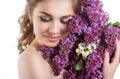 Beauty fashion model Girl with Lilac Flowers Hairstyle. Royalty Free Stock Photo