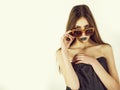 Beauty fashion model girl portrait, wearing stylish sunglasses, copy space Royalty Free Stock Photo