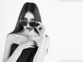 Beauty fashion model girl portrait, wearing stylish sunglasses, copy space Royalty Free Stock Photo