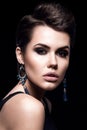 Beauty Fashion Model Girl with short hair. Brunette Model Portrait. Short haircut. Woman Makeup and Accessories. Royalty Free Stock Photo