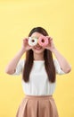 Beauty fashion model girl taking sweets and colorful donuts Royalty Free Stock Photo