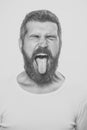 Beauty Fashion model man. Fashion look. man with long beard with closed eyes and tongue