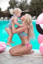 Beauty fashion mother with daughter family look. Beautiful blond Royalty Free Stock Photo