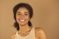 Beauty portrait of attractive young african american woman with neon color make-up smiling at camera Royalty Free Stock Photo