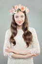 Beauty Fashion Portrait of Beautiful Model Woman in White Lacy Dress and Flowers Wreath