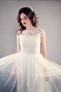 Beauty Fashion Portrait of Pretty Fiancee wearing Wedding Dress