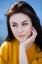 Beauty fashion portrait of young beautiful brunette girl with long black hair and green eyes. Beauty portrait of female face with Royalty Free Stock Photo