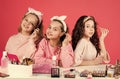 Beauty and fashion. three happy girls at hairdresser. friendship and sisterhood. family bonding time. childhood Royalty Free Stock Photo