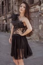 Beauty fashion woman wearing designer stylish dress in the abadoned town