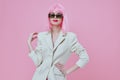 Beauty Fashion woman in White blazer pink hair Glamor Cosmetics color background unaltered Royalty Free Stock Photo