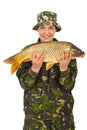 Beauty fisher woman holding carp Royalty Free Stock Photo