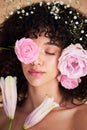 Beauty, flowers and face of woman relax with makeup, cosmetics and hair care for wellness, glamour and glow. Spring