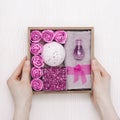 Beauty gift box. Spa relax home with lavender flowers and lavender oil, bath bomb, sea salt, bath roses, towel Royalty Free Stock Photo