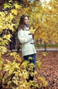 Beauty girl in autumn park Royalty Free Stock Photo