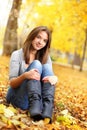 Beauty girl in autumn park Royalty Free Stock Photo