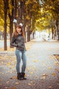 Beauty girl in autumn park Royalty Free Stock Photo