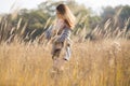 Beauty girl with long red blowing hair outdoors. Royalty Free Stock Photo