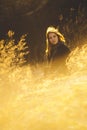 Beauty Girl Outdoors enjoying nature. Beautiful Teenage Model girl with long healthy blowing hair running on the Spring Field, Sun Royalty Free Stock Photo