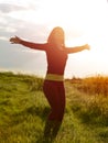 Beauty Girl Outdoors enjoying nature at sunset Royalty Free Stock Photo