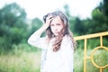 Beauty Girl Outdoors enjoying nature. Teenage Model girl running on the Spring Field, Sun Light. Royalty Free Stock Photo