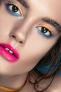 Beauty Girl Portrait with Vivid Makeup. Fashion Woman portrait close up on blue background. Bright Colors. Manicure Make up. Smoky Royalty Free Stock Photo