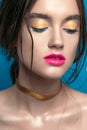 Beauty Girl Portrait with Vivid Makeup. Fashion Woman portrait close up on blue background. Bright Colors. Manicure Make up. Smoky Royalty Free Stock Photo