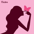 Beauty girl silhouette with butterfly on pink background Royalty Free Stock Photo