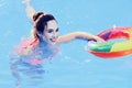 Beauty girl Swimming Pool Concept. Beautiful young girl on the beach. Relax in spa swimming pool. Happy sea lifestyle Royalty Free Stock Photo