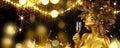 Beauty Golden Christmas Woman with champagne. Beautiful girl drinking sparkling wine, over glowing holiday background