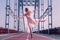 Beautiful graceful young woman doing elegant movements Royalty Free Stock Photo