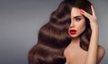 Beauty hair girl portrait. Red lips makeup, manicure nails and h