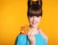 Beauty happy smiling teen girl Eating colourful lollipop. Lollyp Royalty Free Stock Photo