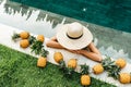 Beautiful Woman Relaxing In Swimming Pool With Pineapples. Healthy Lifestyle, Nutrition, Diet. Summer Vacation Royalty Free Stock Photo