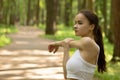 Beauty, health, fitness. Girl does exercises in the park, does exercises in nature Royalty Free Stock Photo