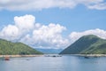 The beauty inside the dam and the houseboat on the bright sky at Sri Nakarin dam , Kanchana buri in Thailand