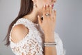 Beauty, jewelry and luxury concept - close up of beautiful. Woman bracelet and ring Royalty Free Stock Photo