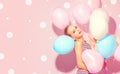 Beauty joyful teenage girl with colorful air balloons