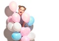 Beauty joyful teenage girl with colorful air balloons having fun