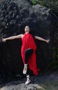 The beauty lady wearing red suit and satin ballet shoes,point leg up