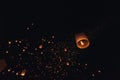 The beauty of the lanterns floating in the sky during the Yi Peng Festival and the Floating Lantern Festival in Chiang Mai Royalty Free Stock Photo