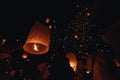 The beauty of the lanterns floating in the sky during the Yi Peng Festival and the Floating Lantern Festival in Chiang Mai Royalty Free Stock Photo