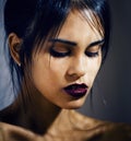 beauty latin young woman in depression, hopelessness look, fashion makeup modern