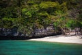 Beauty limestone rock in the ocean and beach with Royalty Free Stock Photo