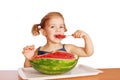 Beauty little girl eating watermelon